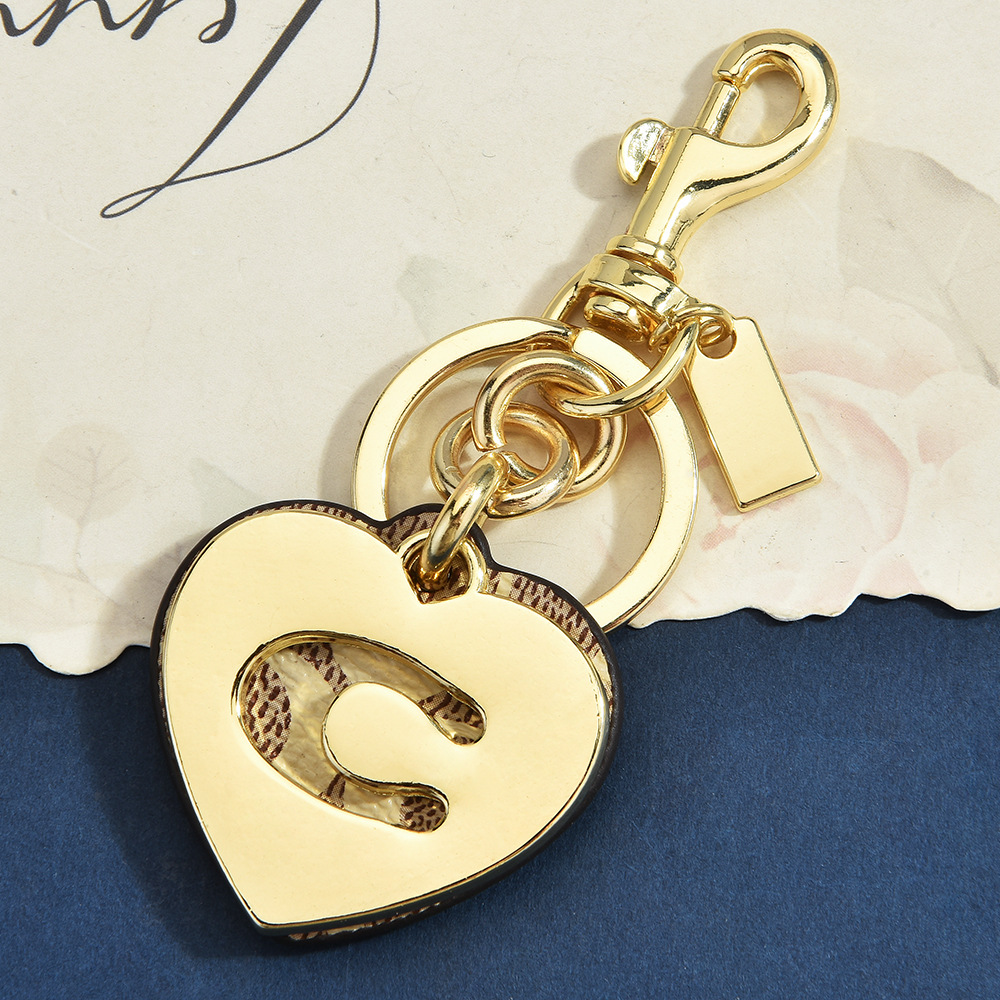 พวงกุญแจหนังลายดอกไม้รูปหัวใจพ - Monogram Keychain Leather บทวิจารณ์และราคา
